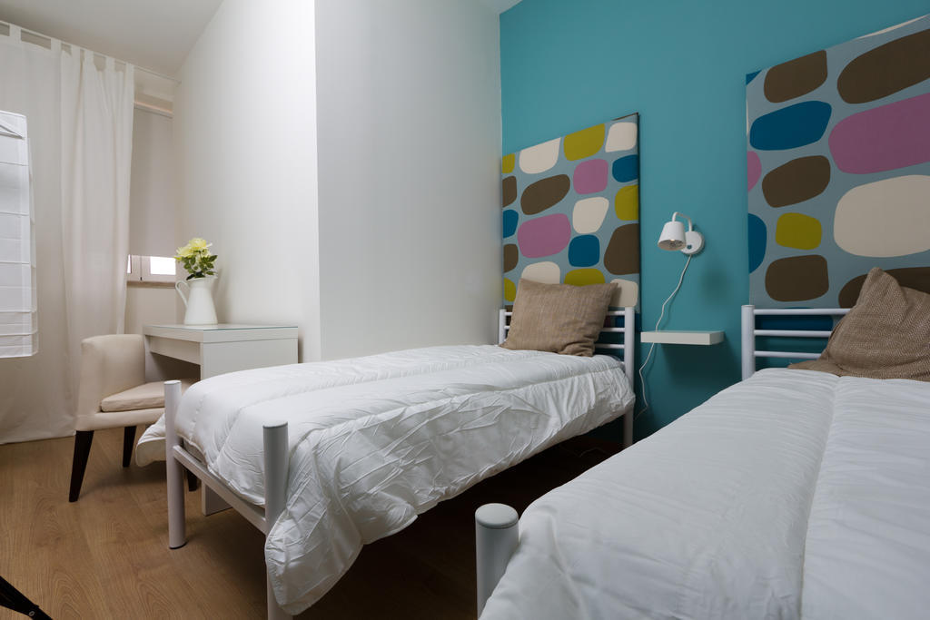 Hotel Turismo Do Seculo Estoril Zimmer foto A bedroom at the hotel
