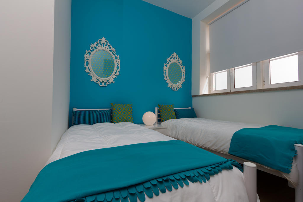 Hotel Turismo Do Seculo Estoril Zimmer foto A bedroom at the hotel
