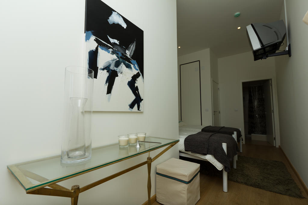 Hotel Turismo Do Seculo Estoril Zimmer foto A bedroom in the apartment